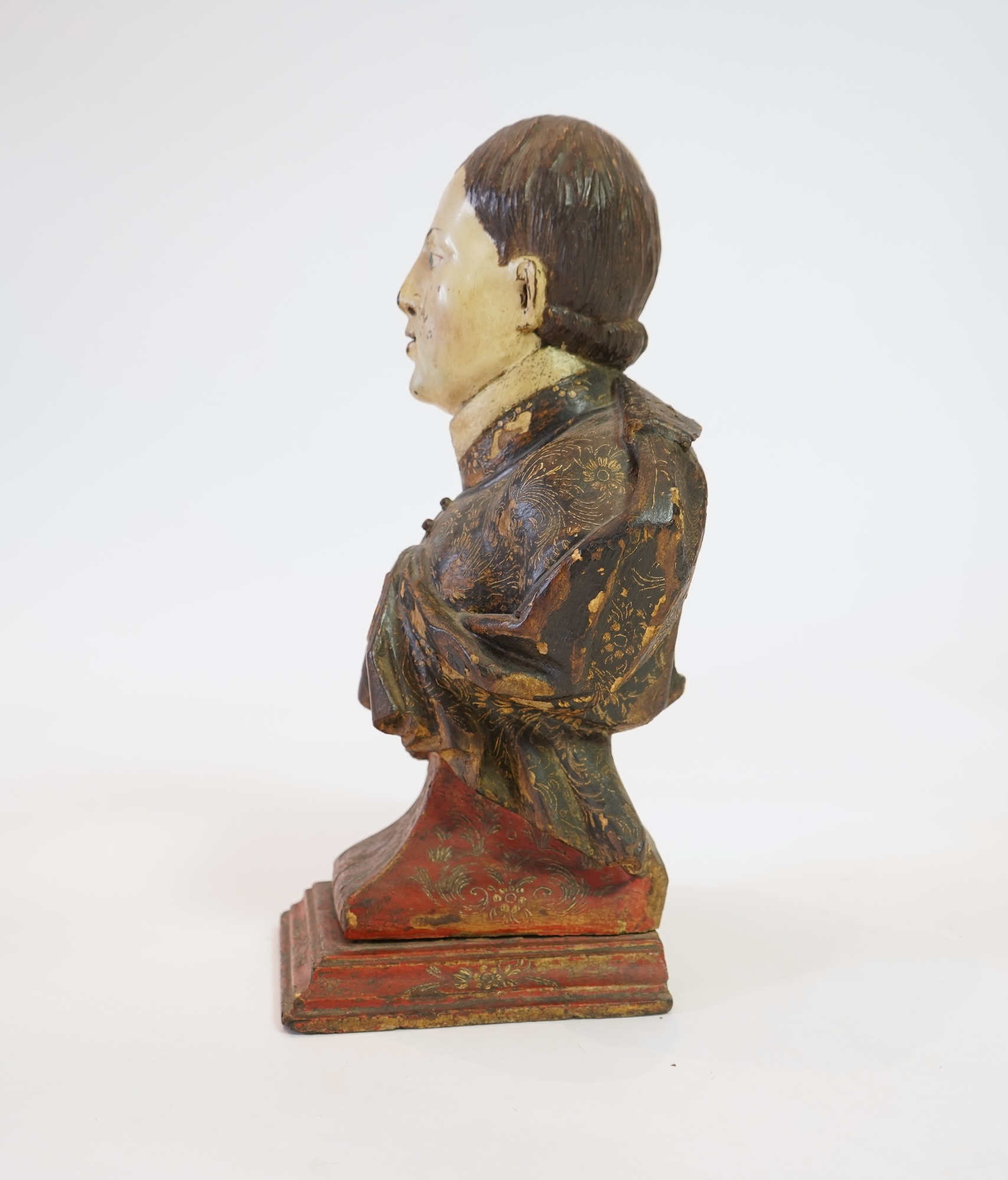 A 19th century Spanish polychrome wood bust of a Saint